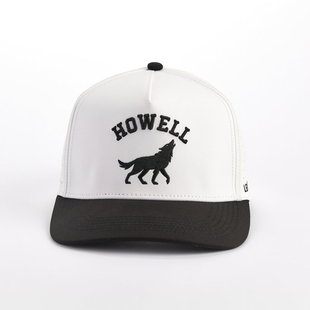 White and black cap with 'HOWELL' and wolf logo on a white background