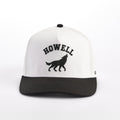 White and black cap with 'HOWELL' and wolf logo on a white background