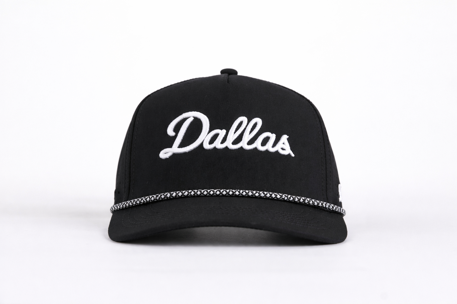 Black cap with 'Dallas' text on a white background