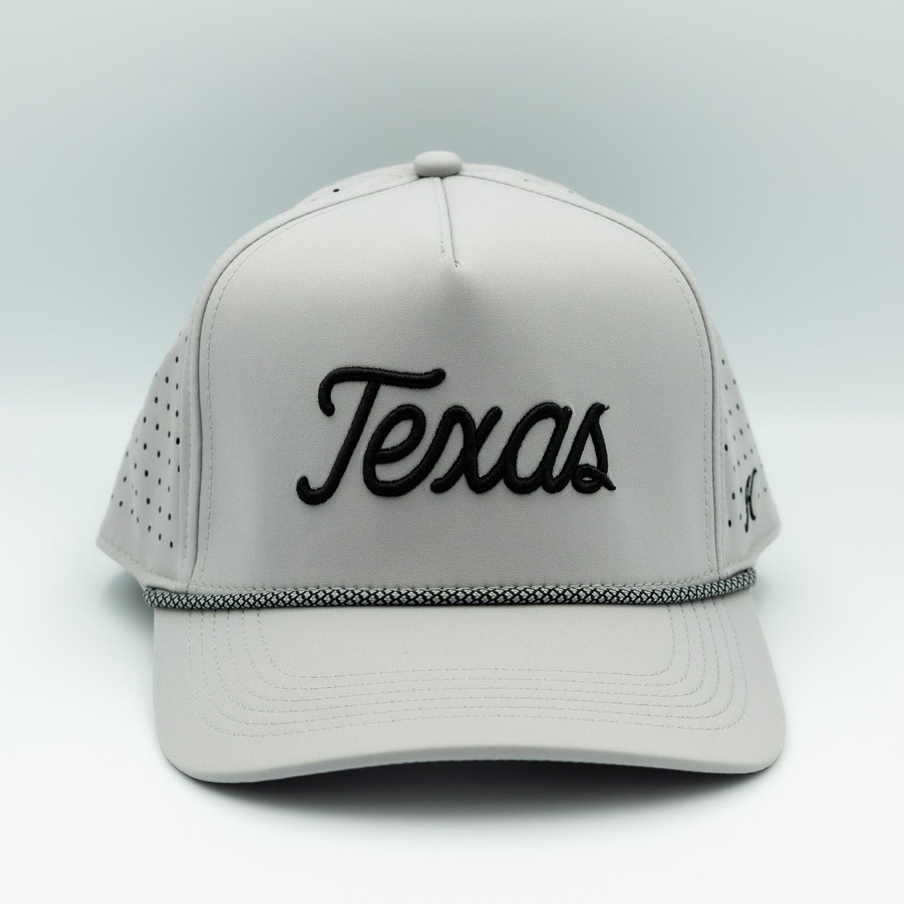 Gray cap with 'Texas' text on a light gray background
