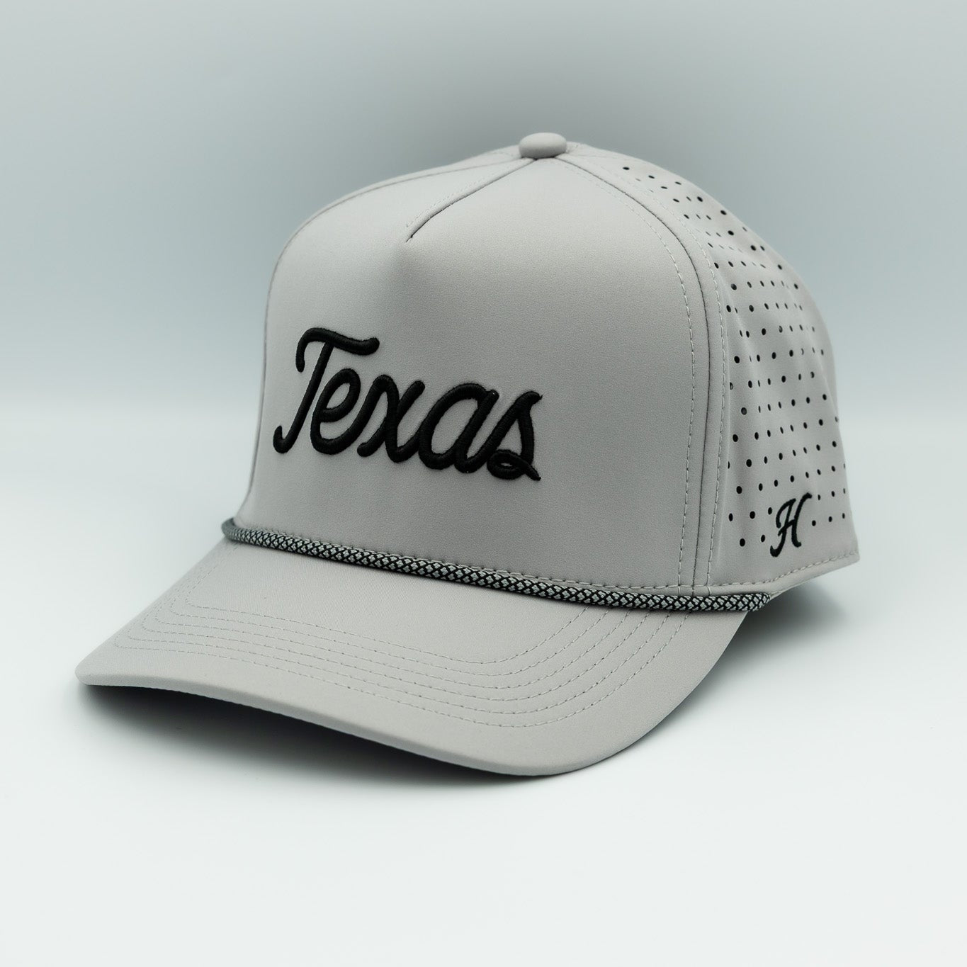 Gray cap with 'Texas' text on a light gray background