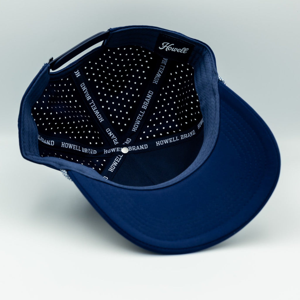 Navy blue cap with branded visor on a white background